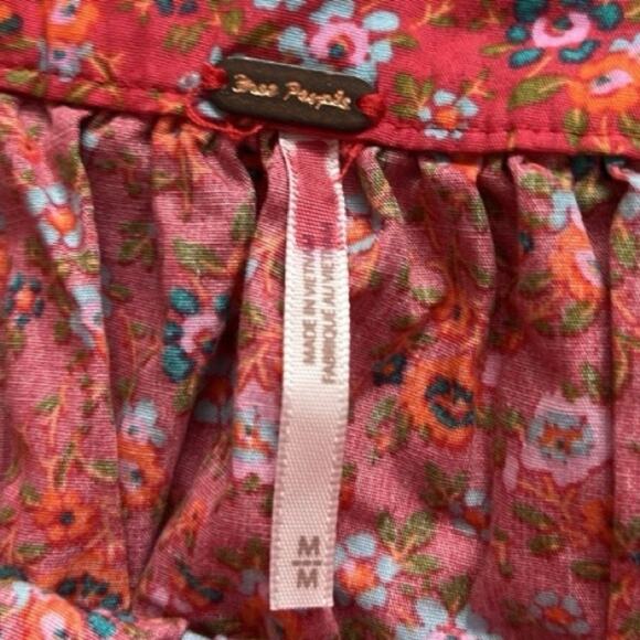 Free People Mini Dress Womens Medium Petunia Floral Apron Smocked Boho NWT - Picture 4 of 14